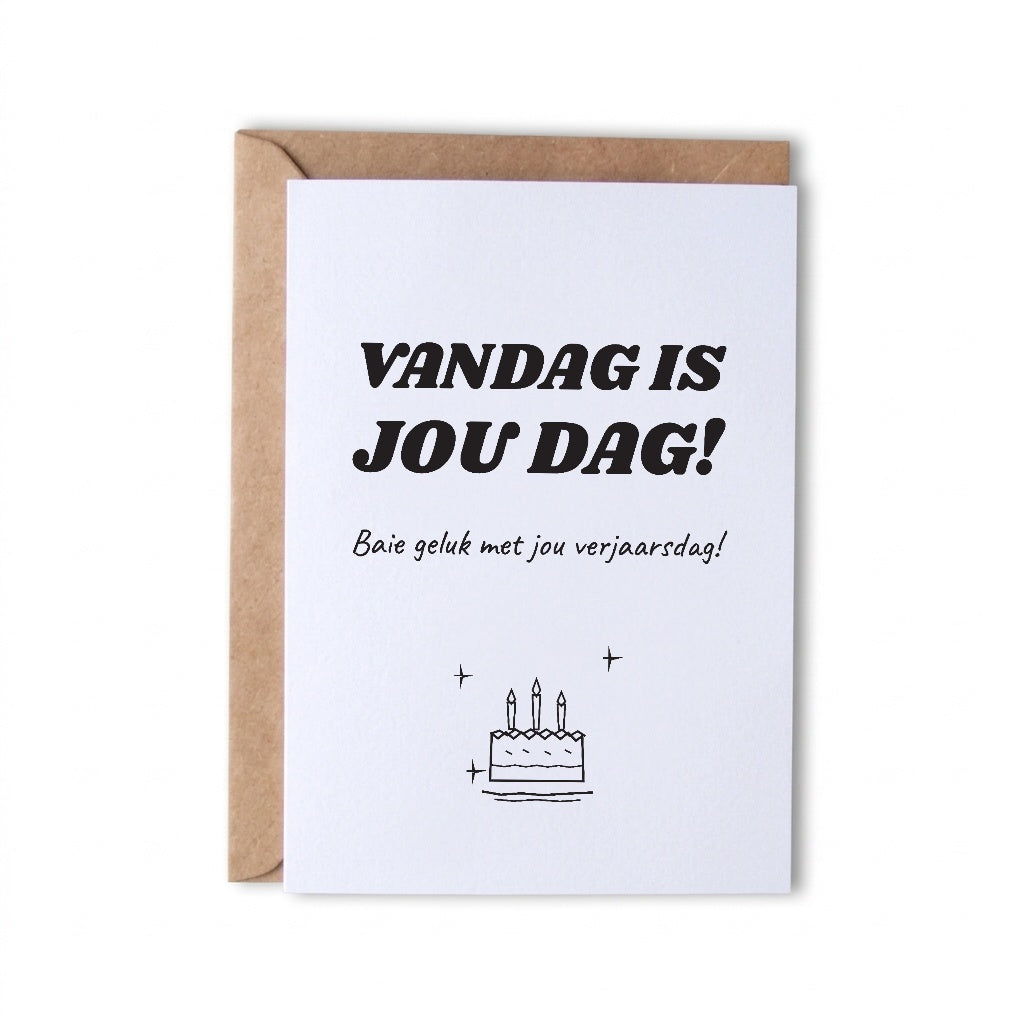 Afrikaanse verjaarsdagkaart met die woorde Vandag is jou dag en ’n handgetekende koek met kerse